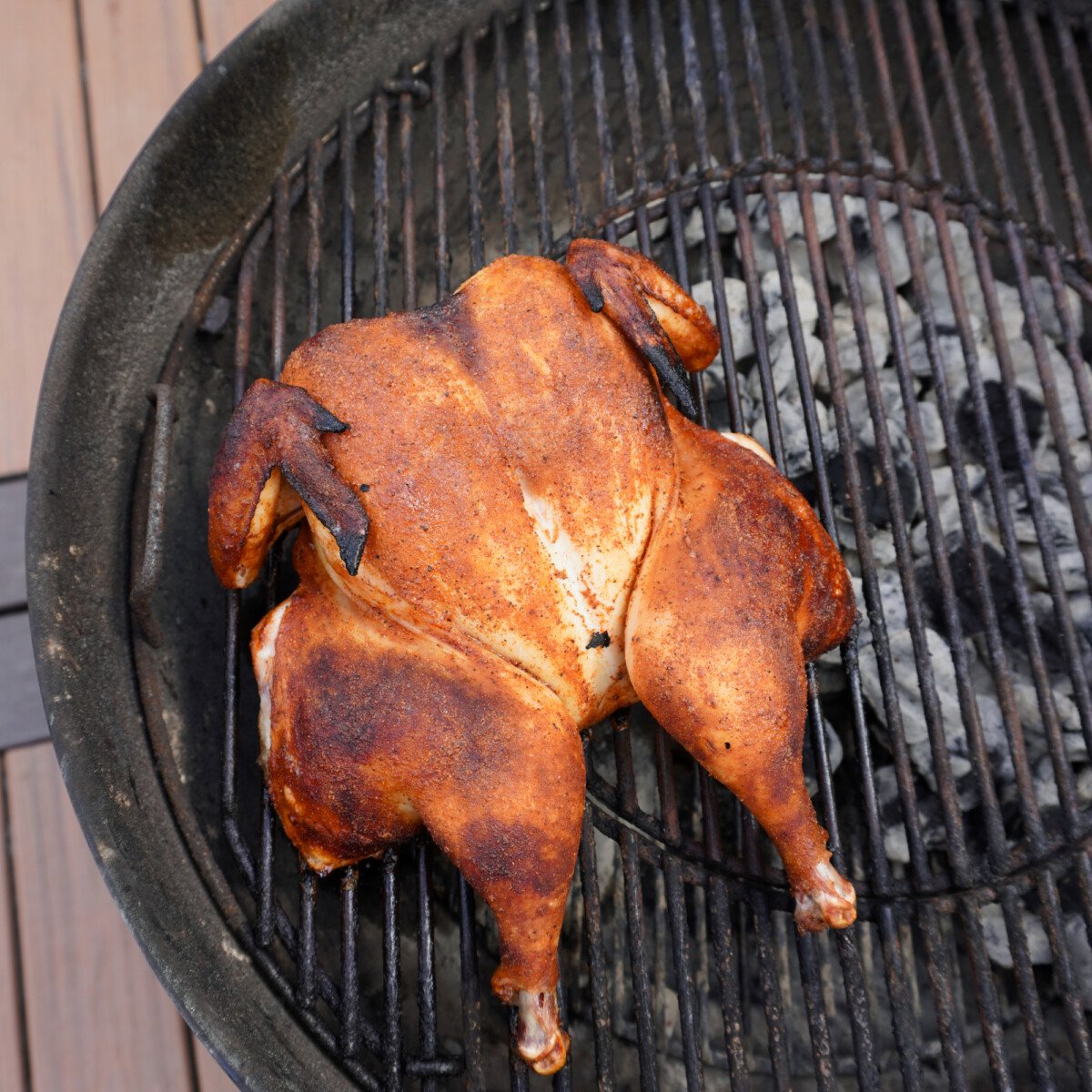 spatchcock chicken on the grill.