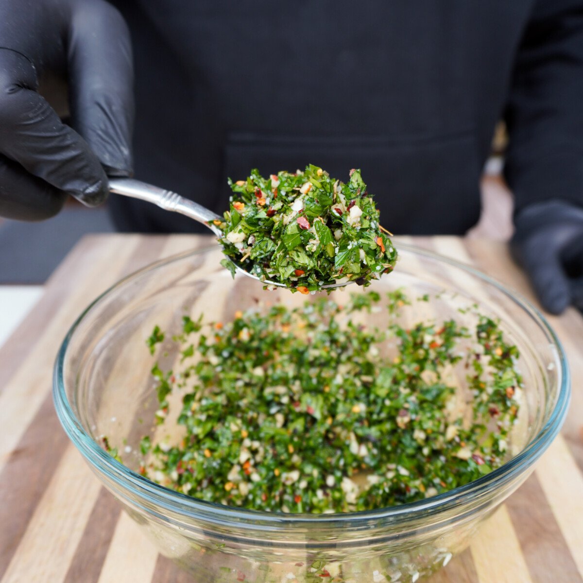 chopped up chimichurri ingredients.