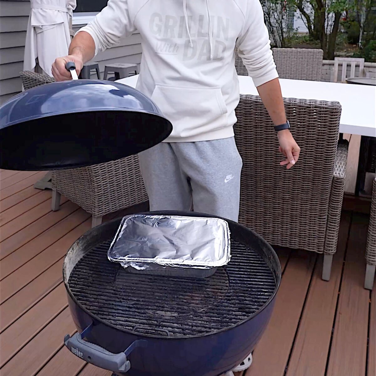 ribs wrapped in pan on the grill. 