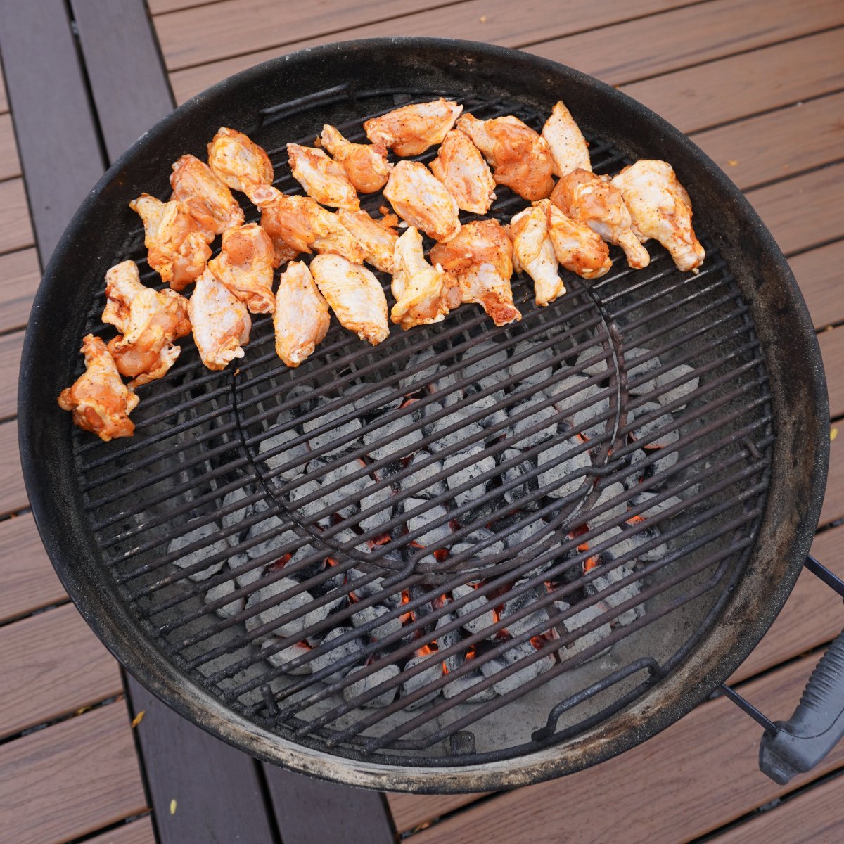 chicken wings on the grill. 