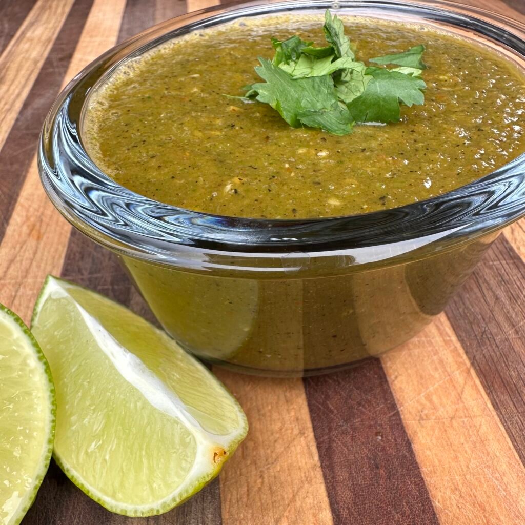green salsa in a small glass bowl.