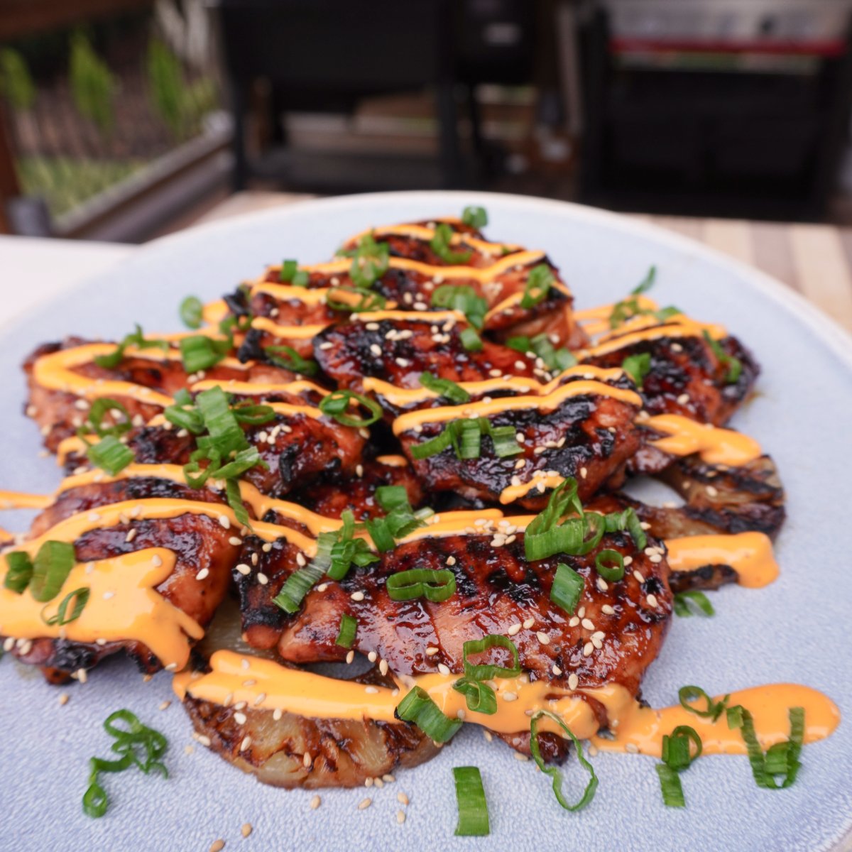 huli huli chicken on a plate.