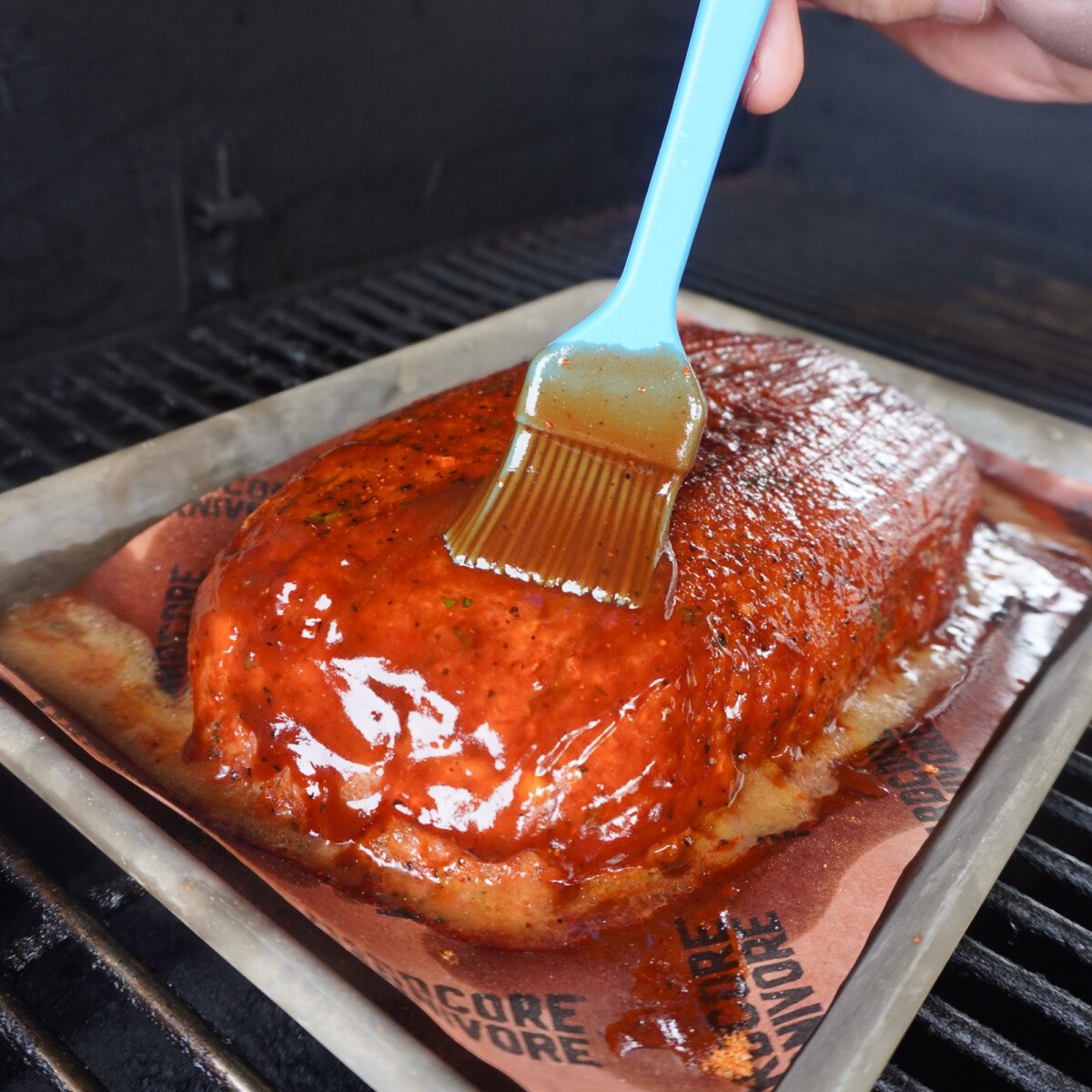 glazing meatloaf on the grill. 