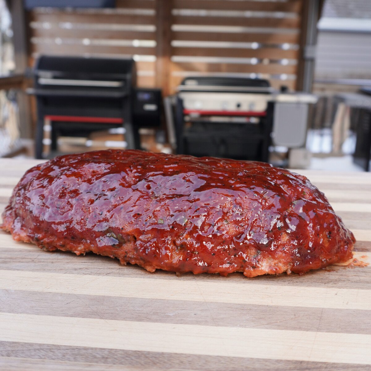 resting meatloaf on cutting board.