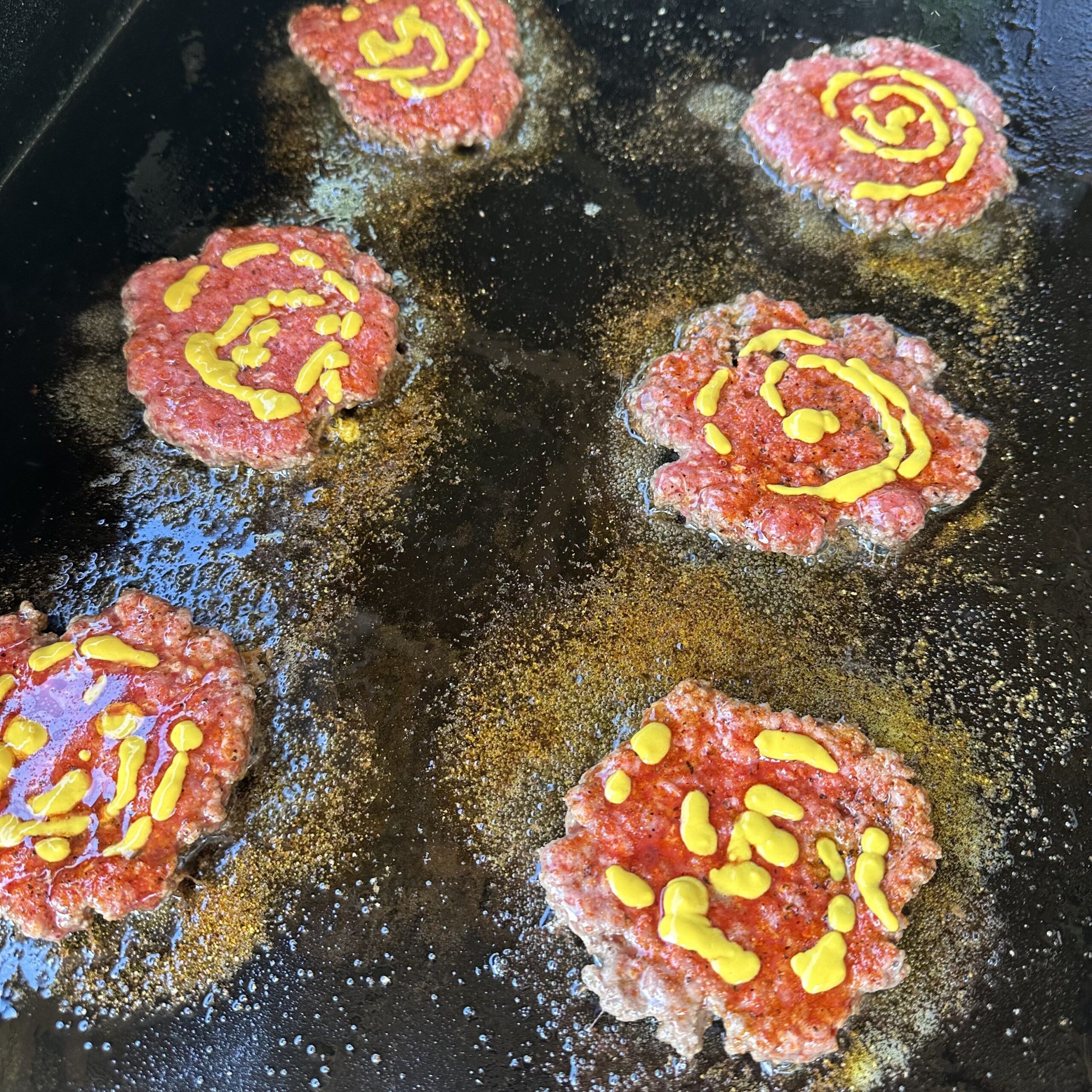 Burger patties on griddle