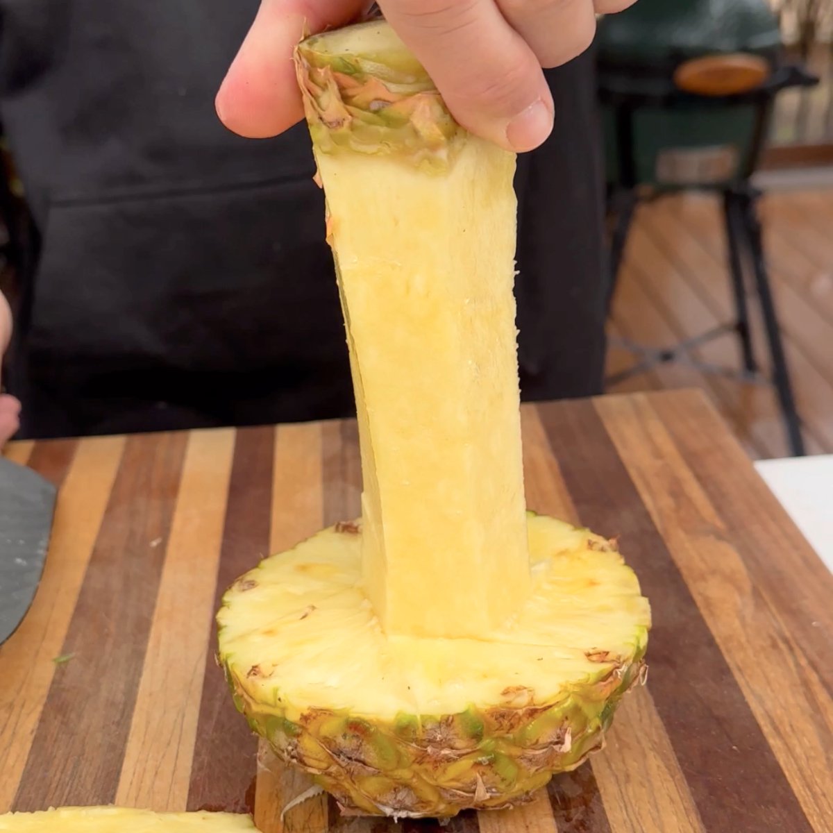 Pineapple core on a cutting board.