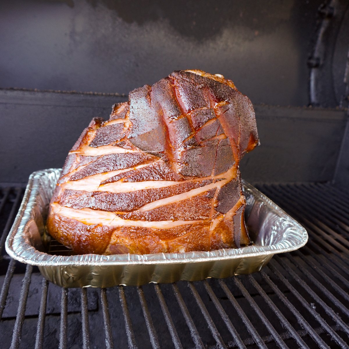 smoked ham in smoker.