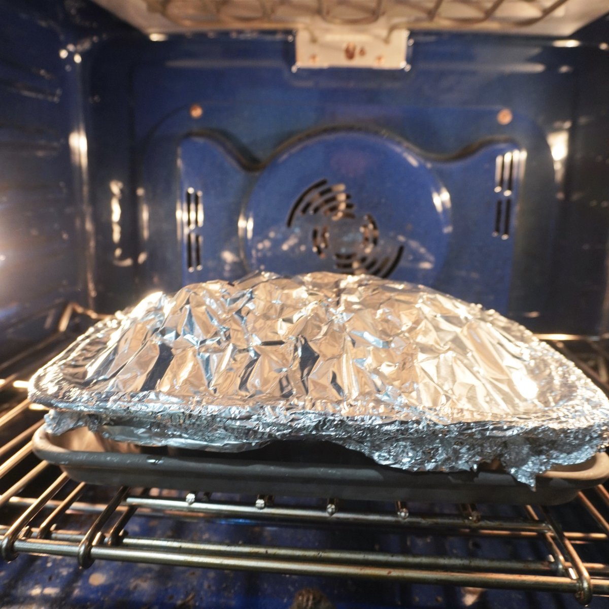 classic pulled pork resting in the oven.