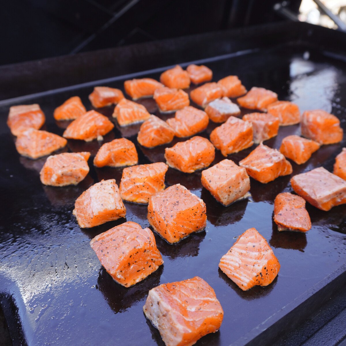 salmon bites on the griddle.