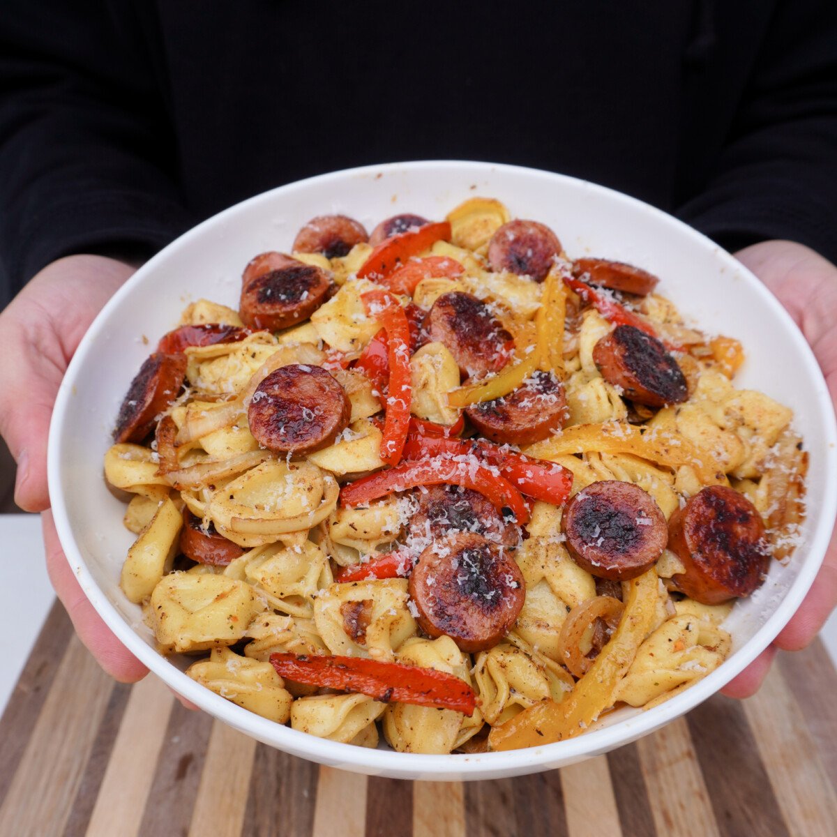 plated sausage and tortellini dinner