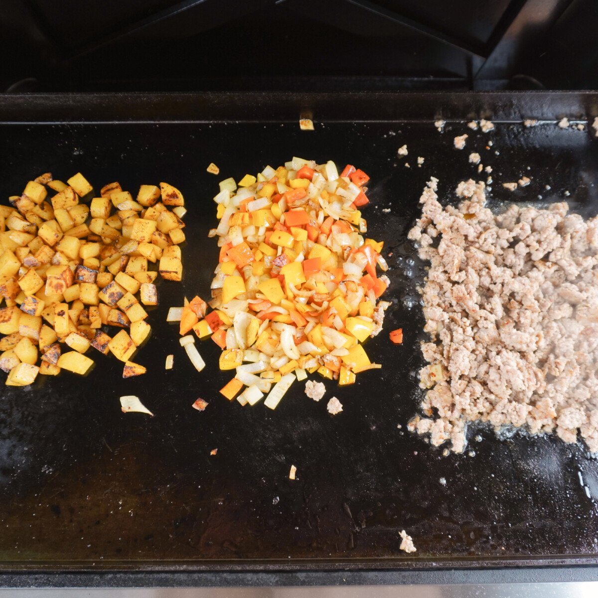 Ingredients cooked on the griddle.