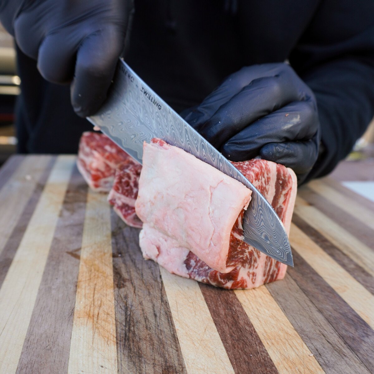 removing the silver skin from short ribs. 