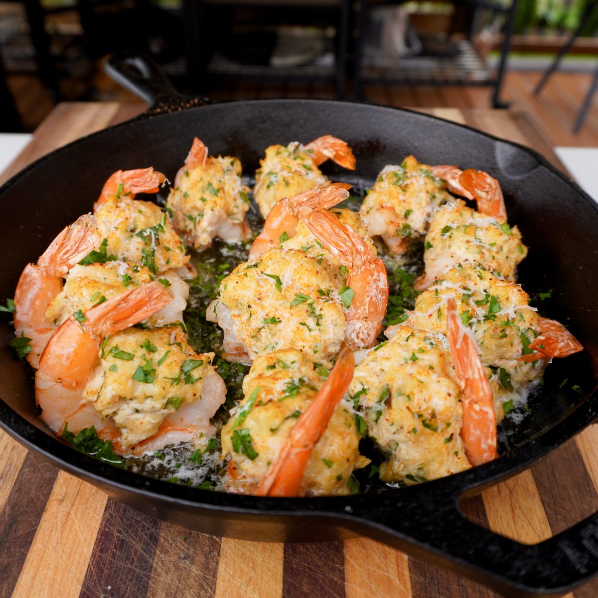 smoked stuffed shrimp in cast iron skillet.