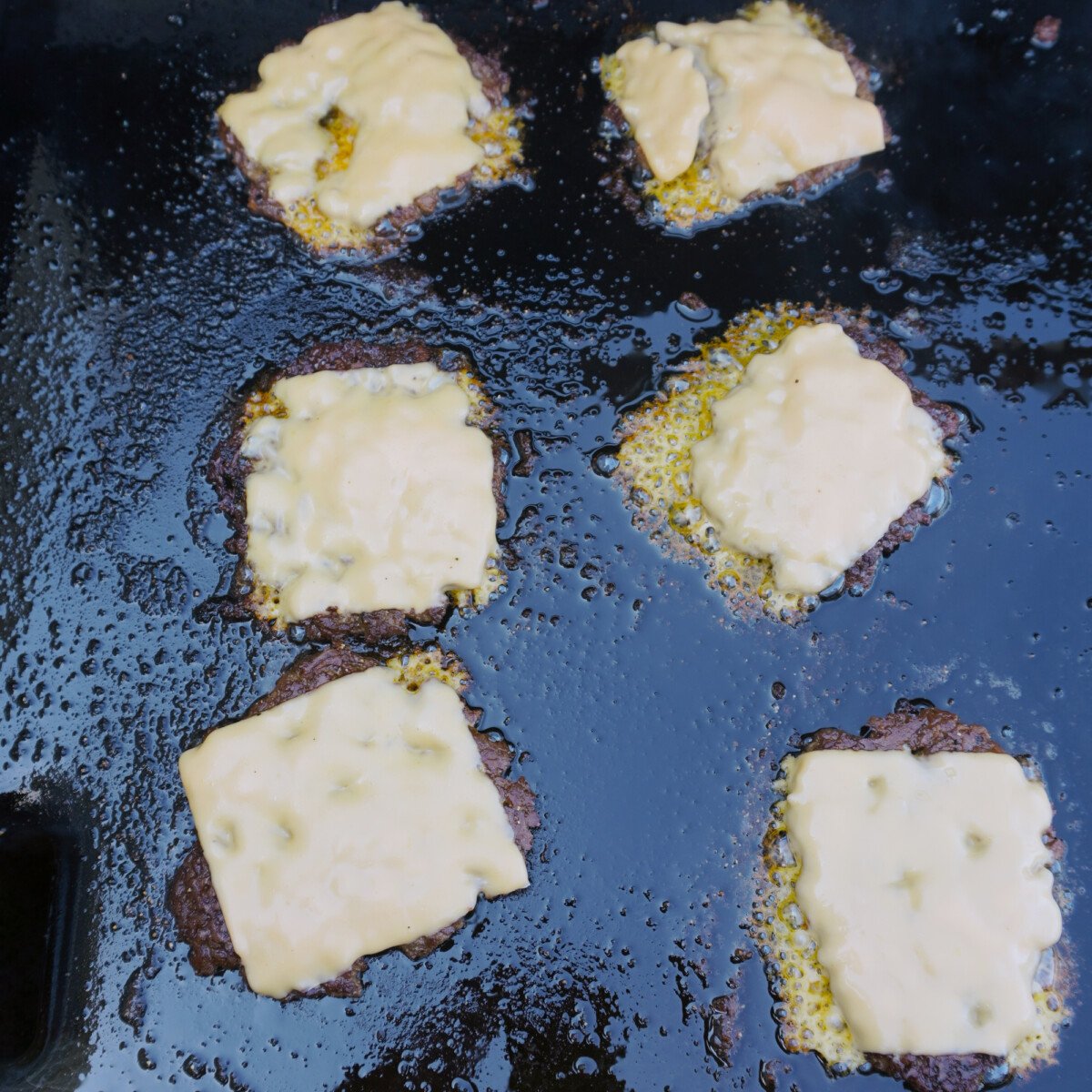 patties with melted cheese.