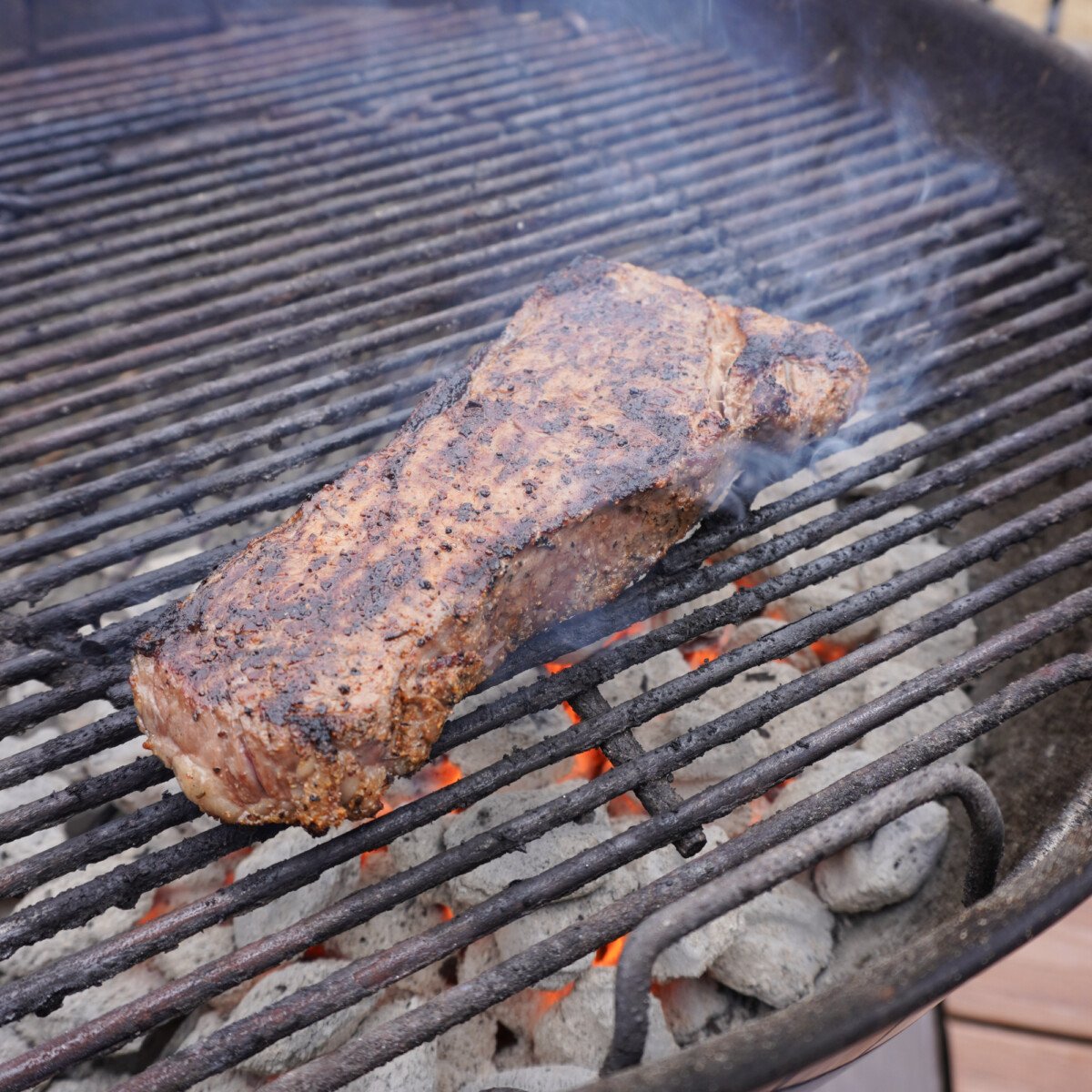 ny strip steak on the grill.