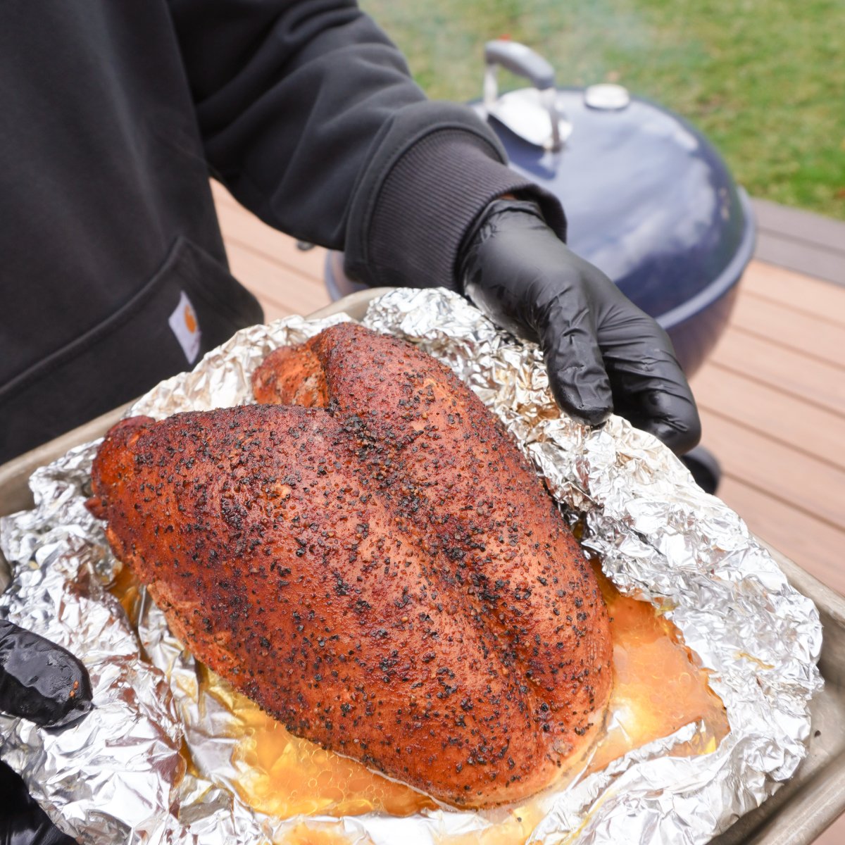 smoked turkey breast in a foil pan. 