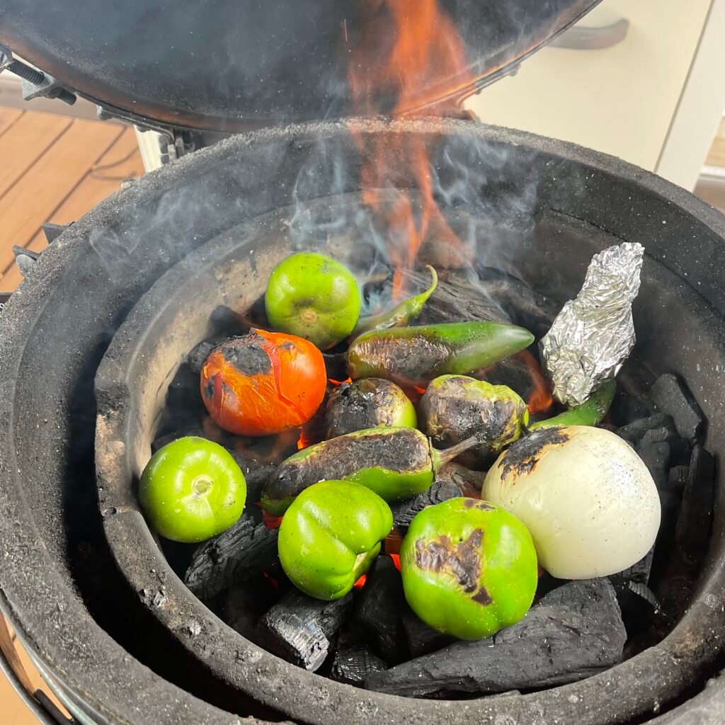 charred veggies on the grill.