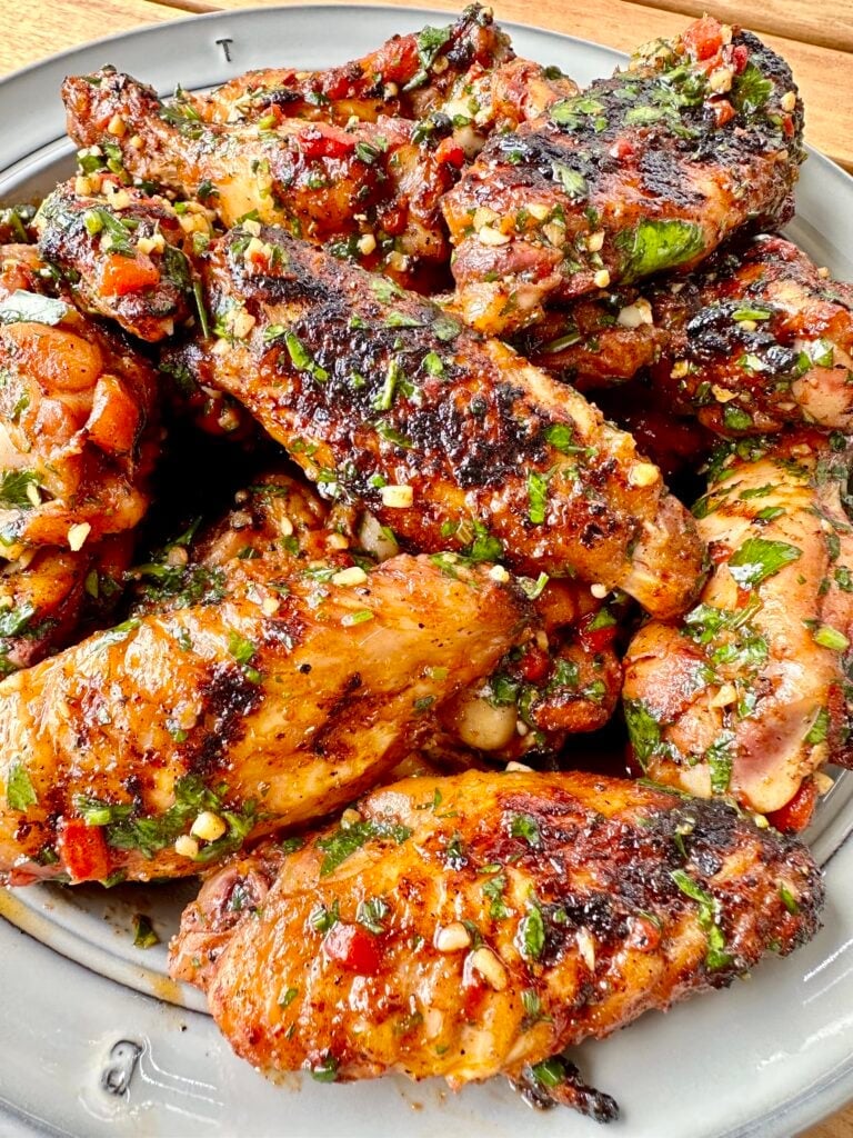 chicken wings with homemade red chimichurri sauce.